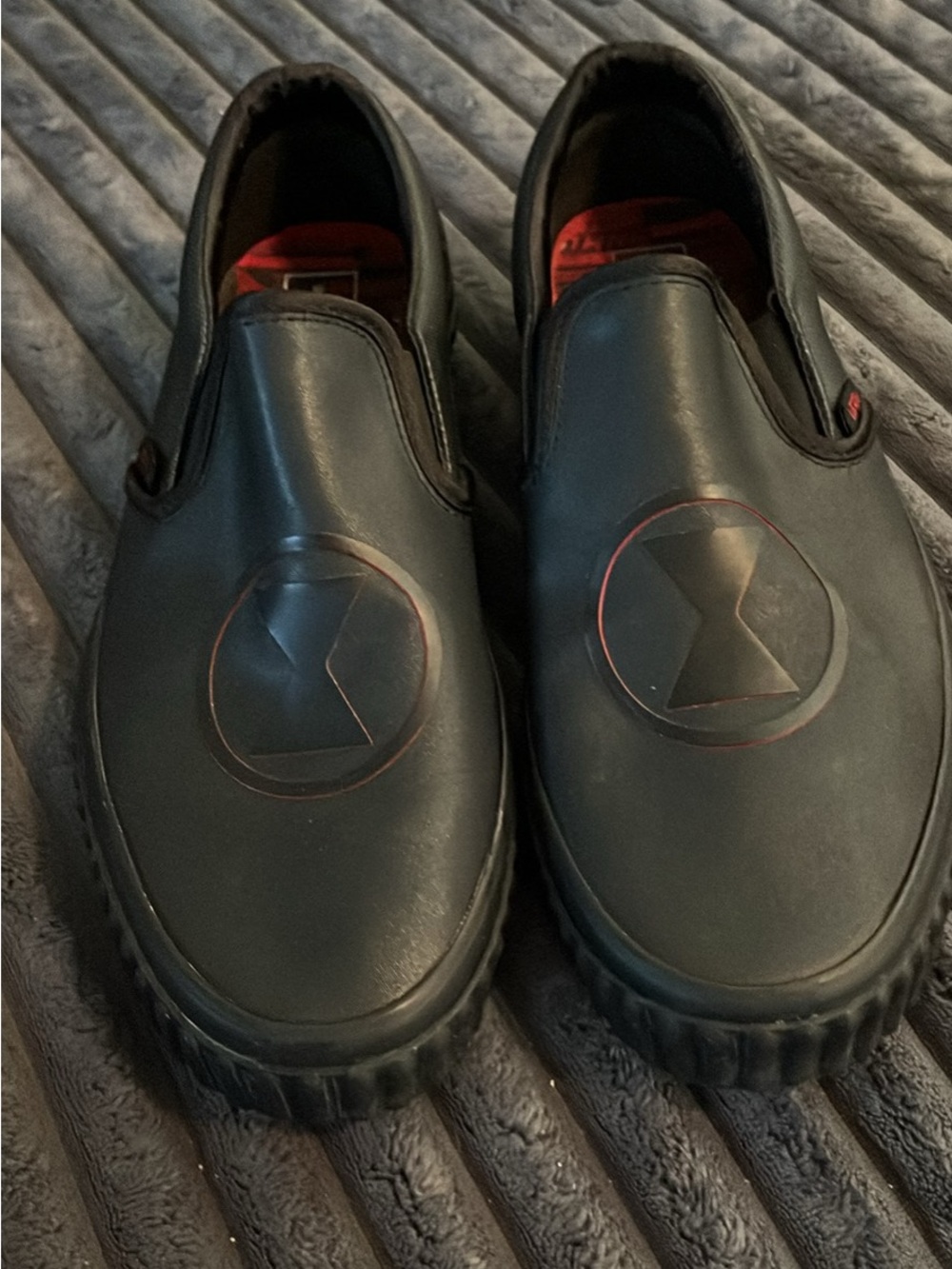Vans Marvel Black Slip-On Sneakers with Red Accents
